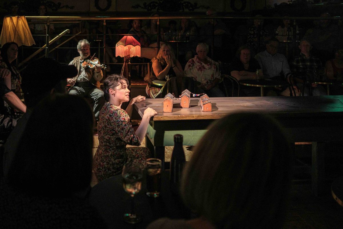 The audience seated at the table